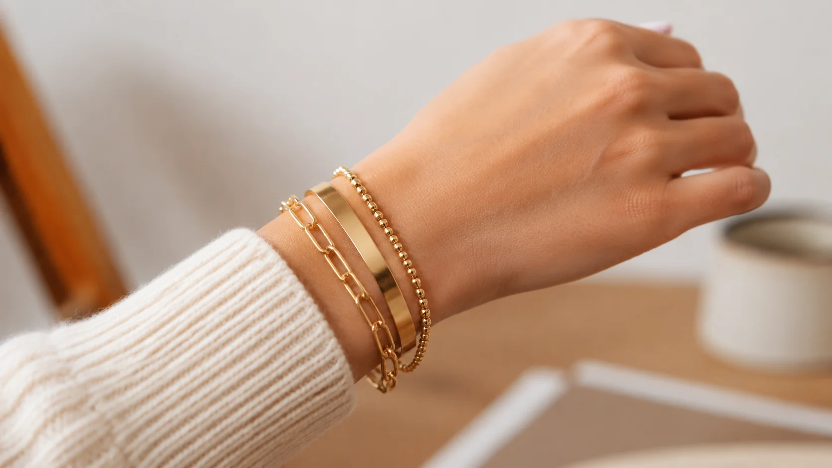 Adjustable stackable gold bangles fitting comfortably on wrist for everyday wear