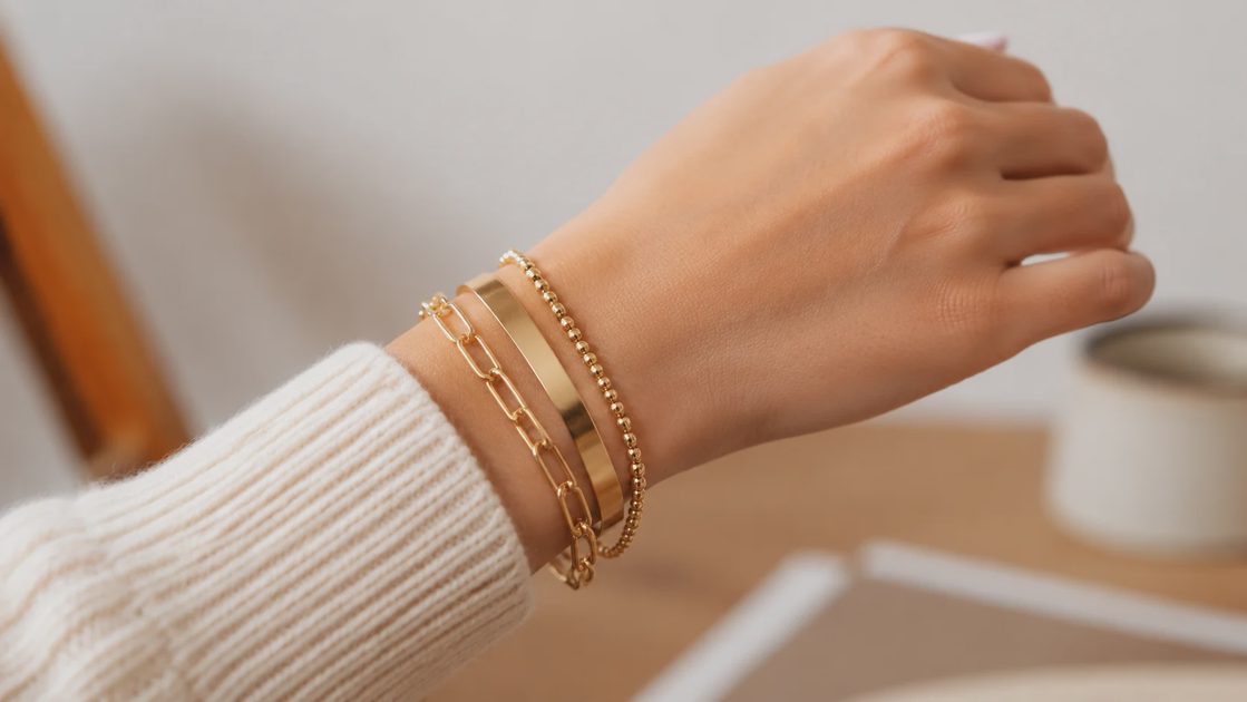 Adjustable stackable gold bangles fitting comfortably on wrist for everyday wear