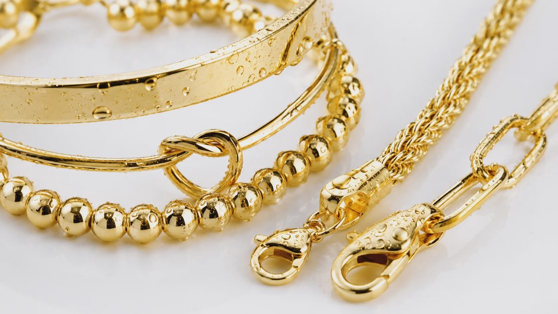 Close-up detail of non-tarnish waterproof 14K gold plated bracelets showing quality construction